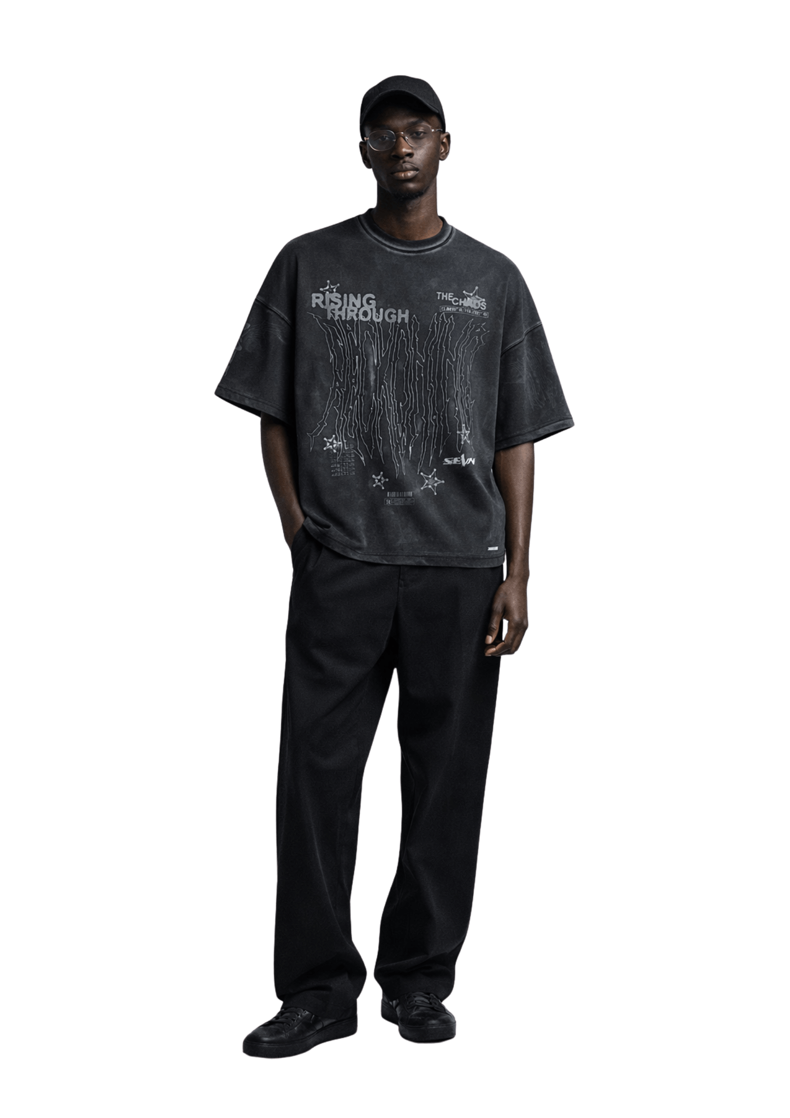 Oversized washed black SEVN SS26 Reckoning tee worn by model – premium heavyweight streetwear